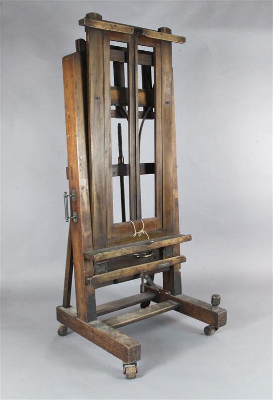 A late Victorian mahogany studio easel, W.2ft 8in. H.6ft 1in.